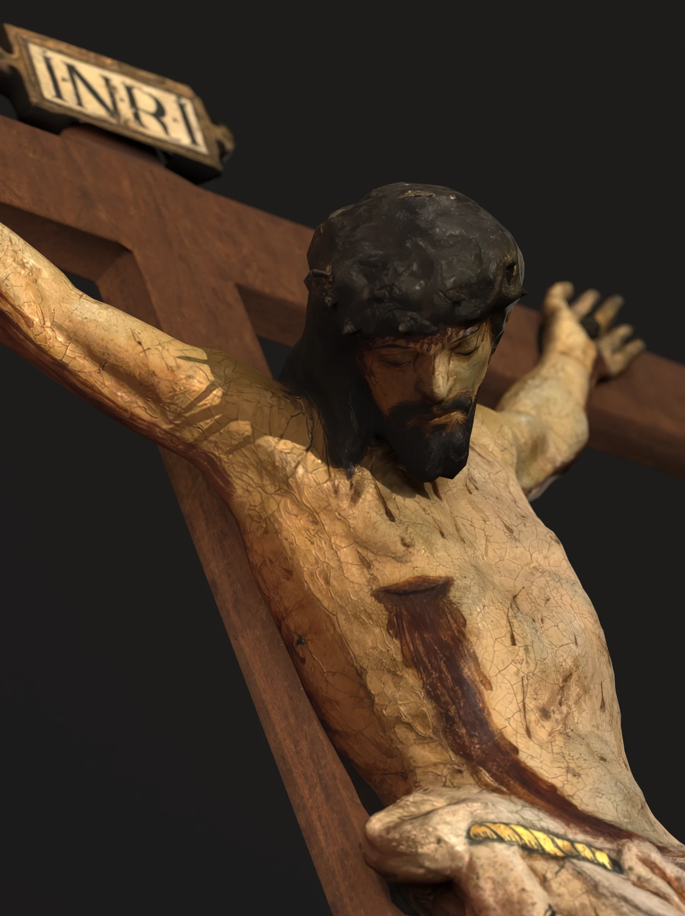 Intricate sculpture of Jesus Christ with golden crown of thorns